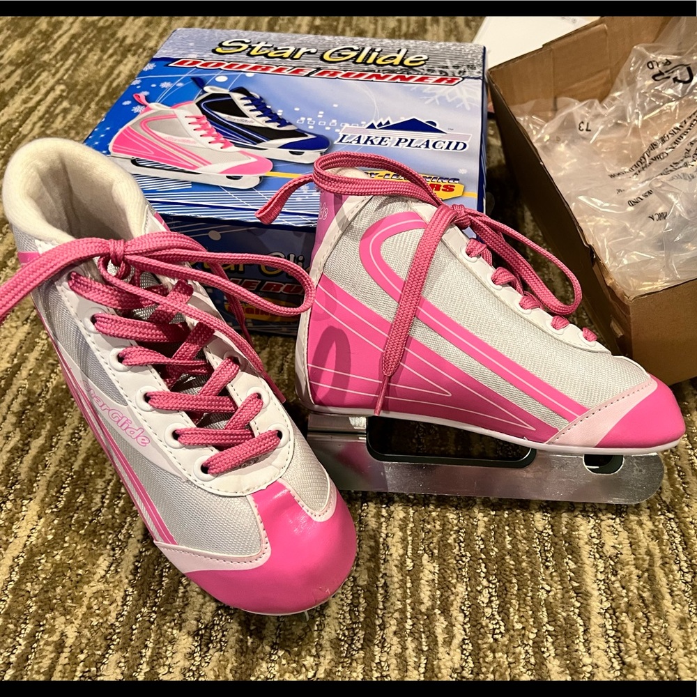 Brand new, never worn pink Ice Skates in original box